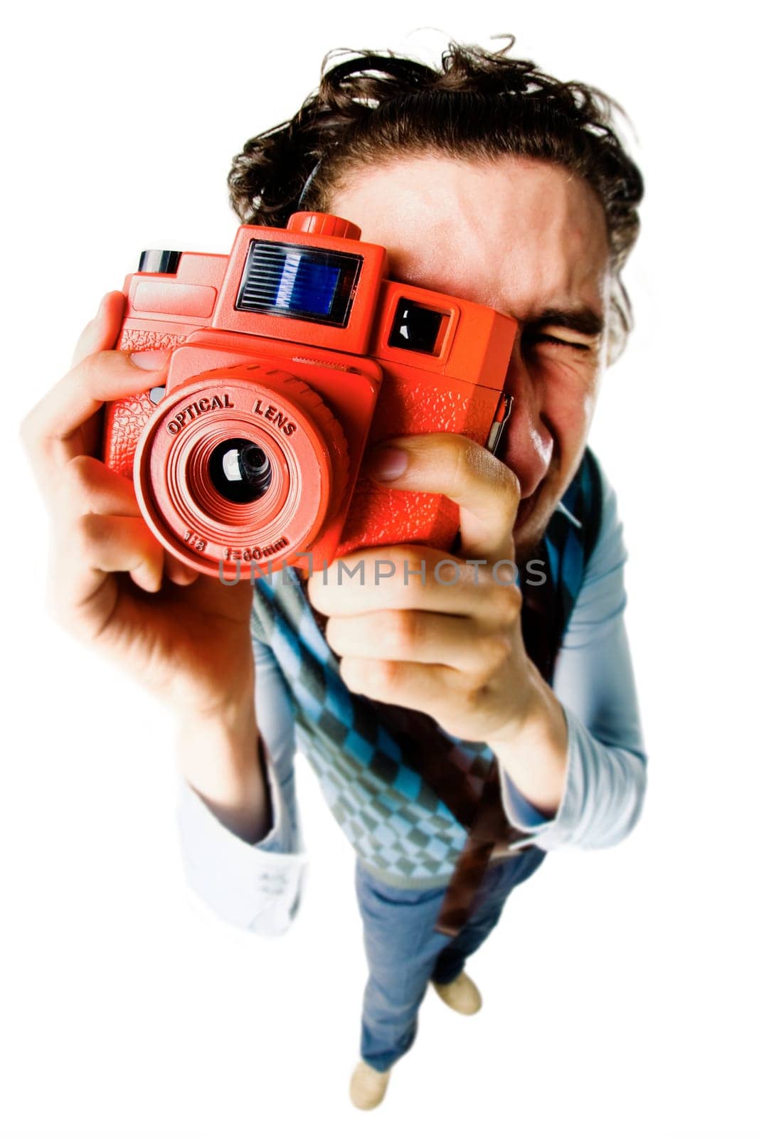 Fish-eye shot of a photographer making picture