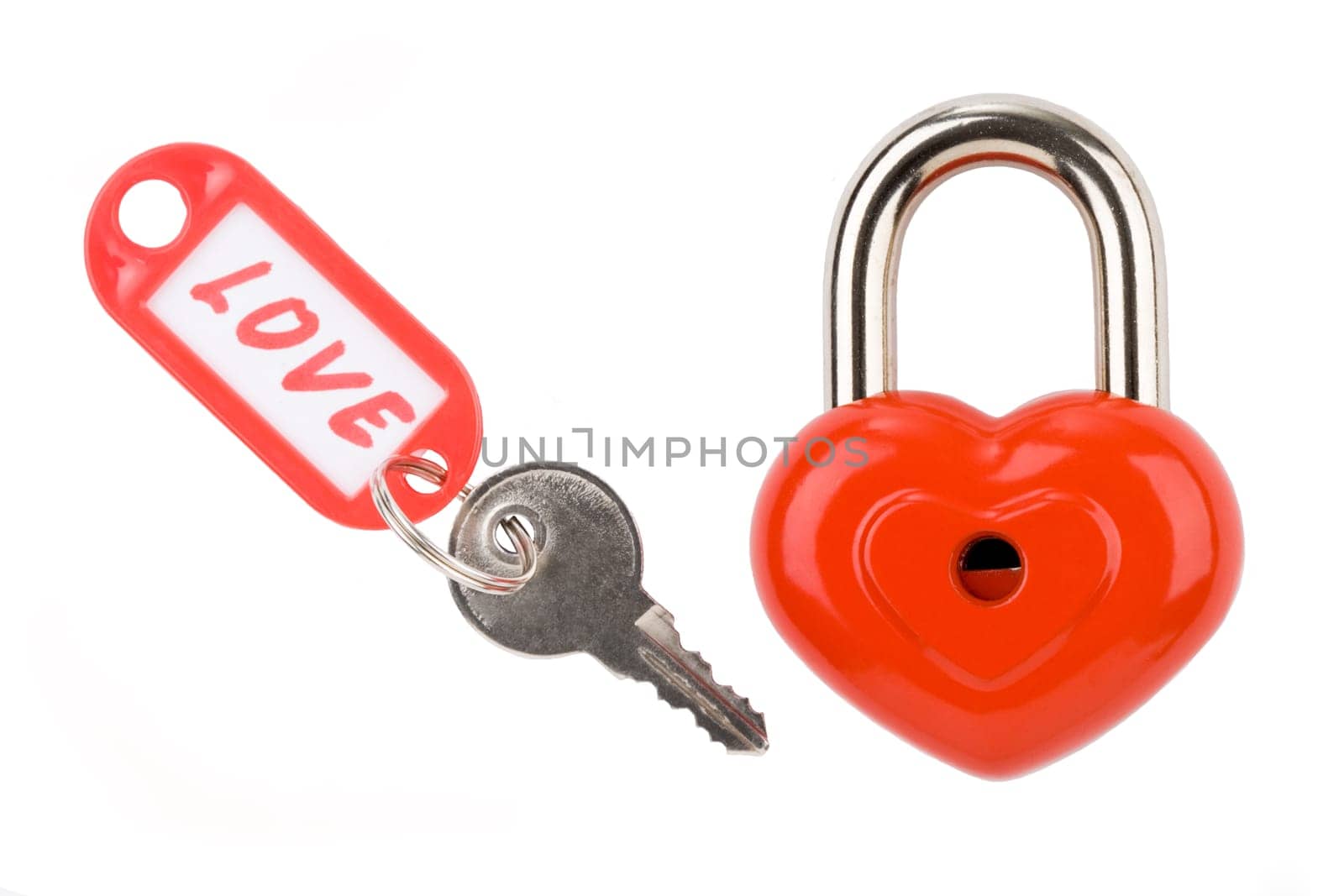 Photo of padlock and key with love label on a white background