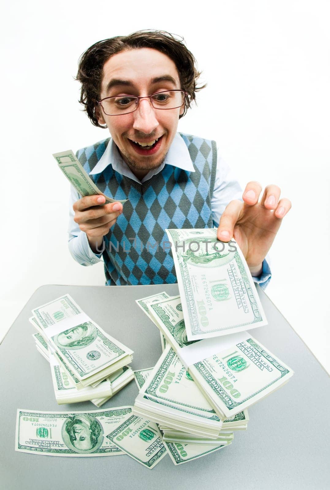 Photo of glad man counting his income with happy smile