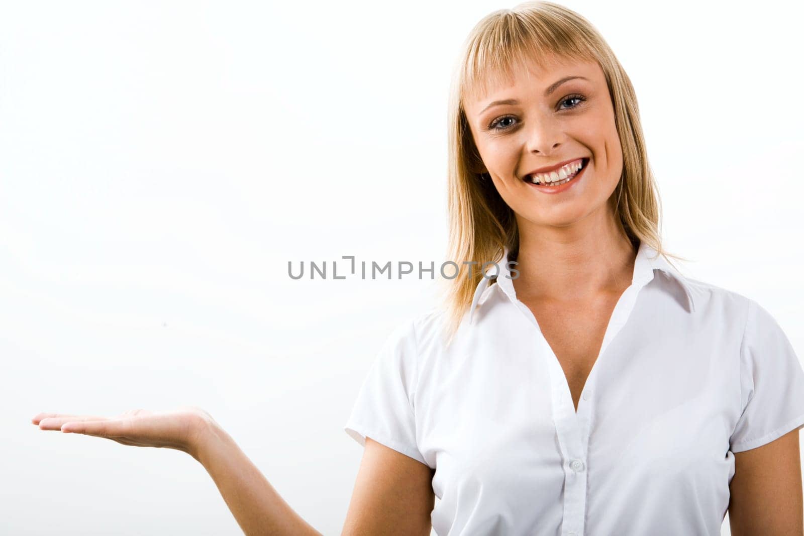 Portrait of young beautiful woman holding elegantly her hand on the white background
