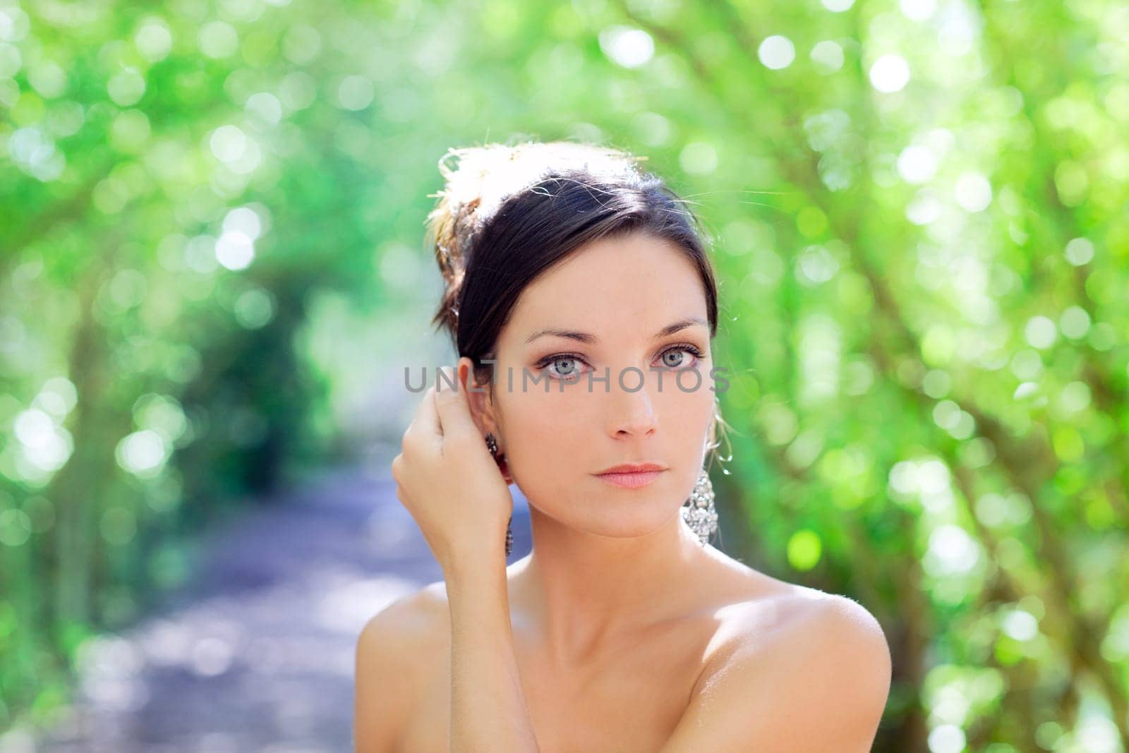beautiful blue eyes woman outdoor green park portrait