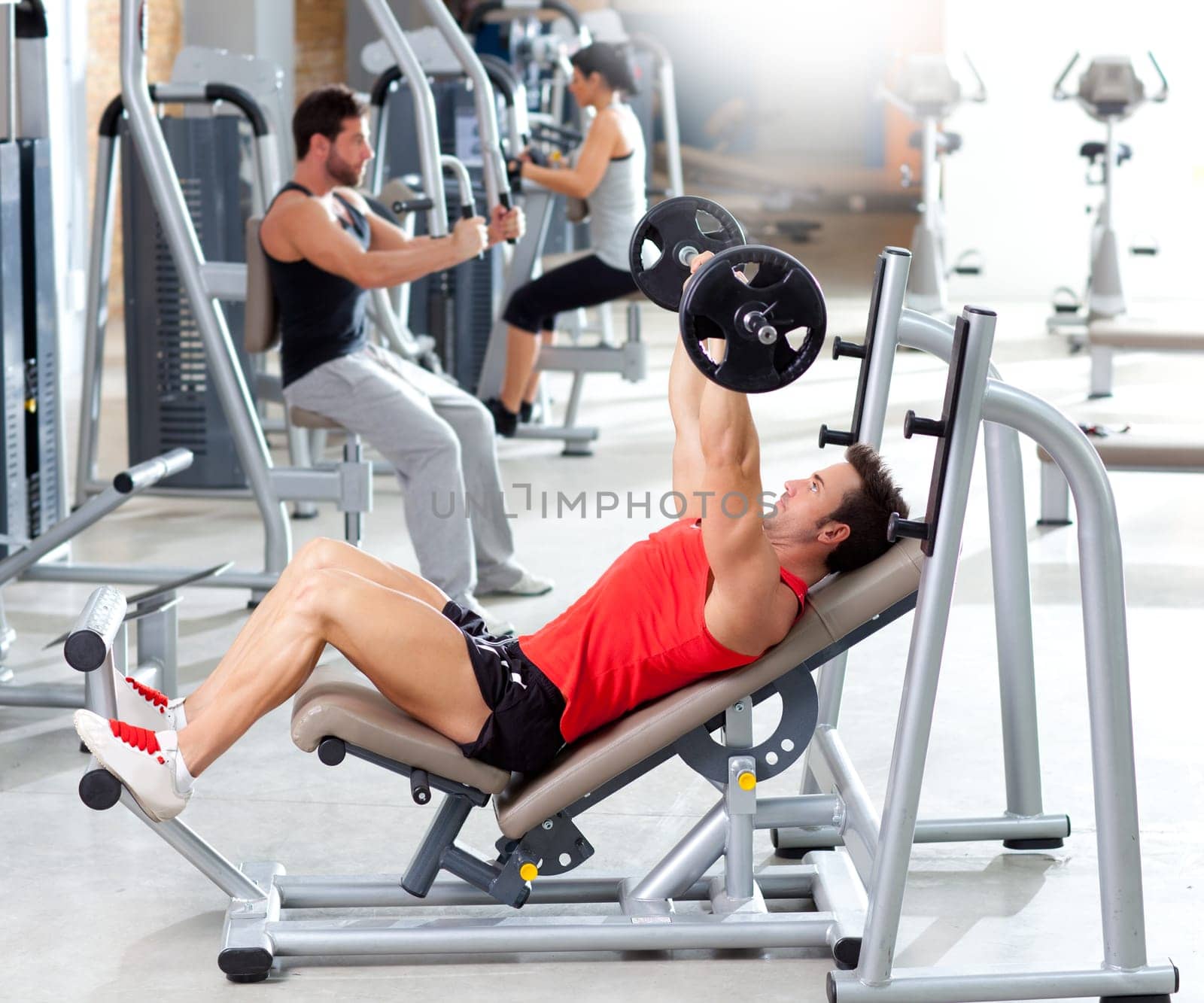 group with weight training equipment on sport gym club