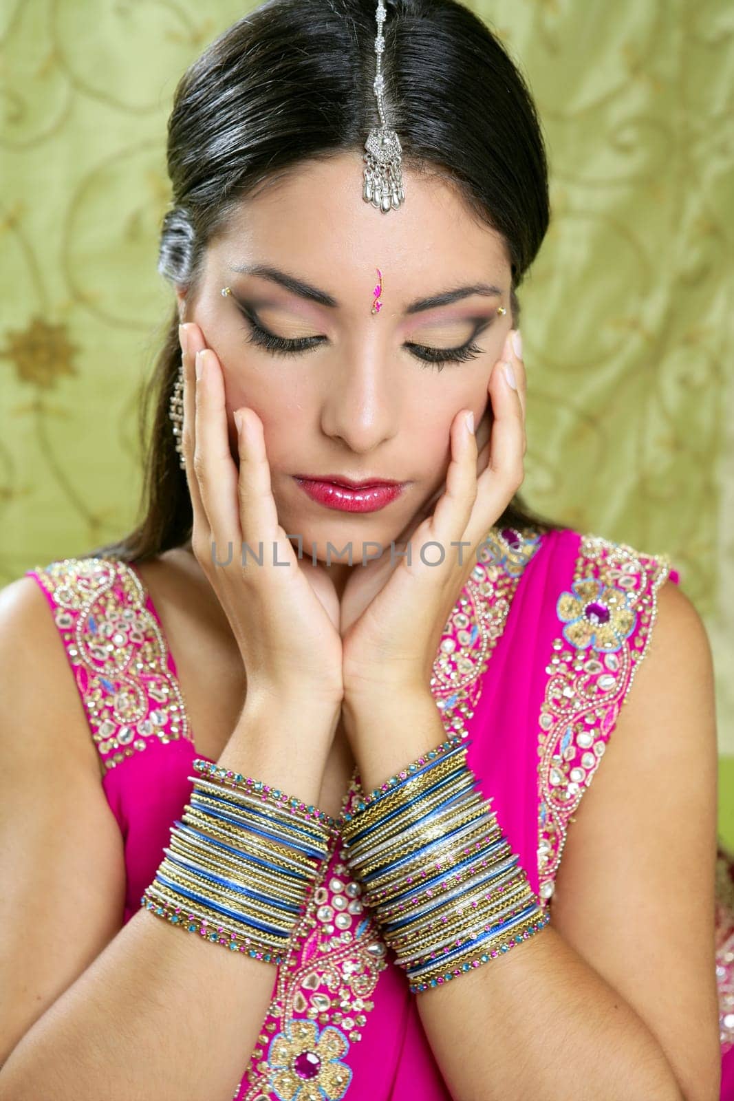 Beautiful indian brunette young woman with traditional fashion