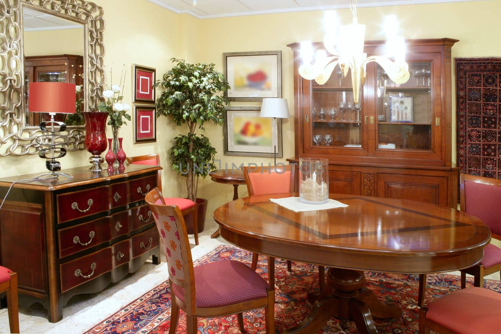 Classic living room table warm wood furniture glowing chandelier