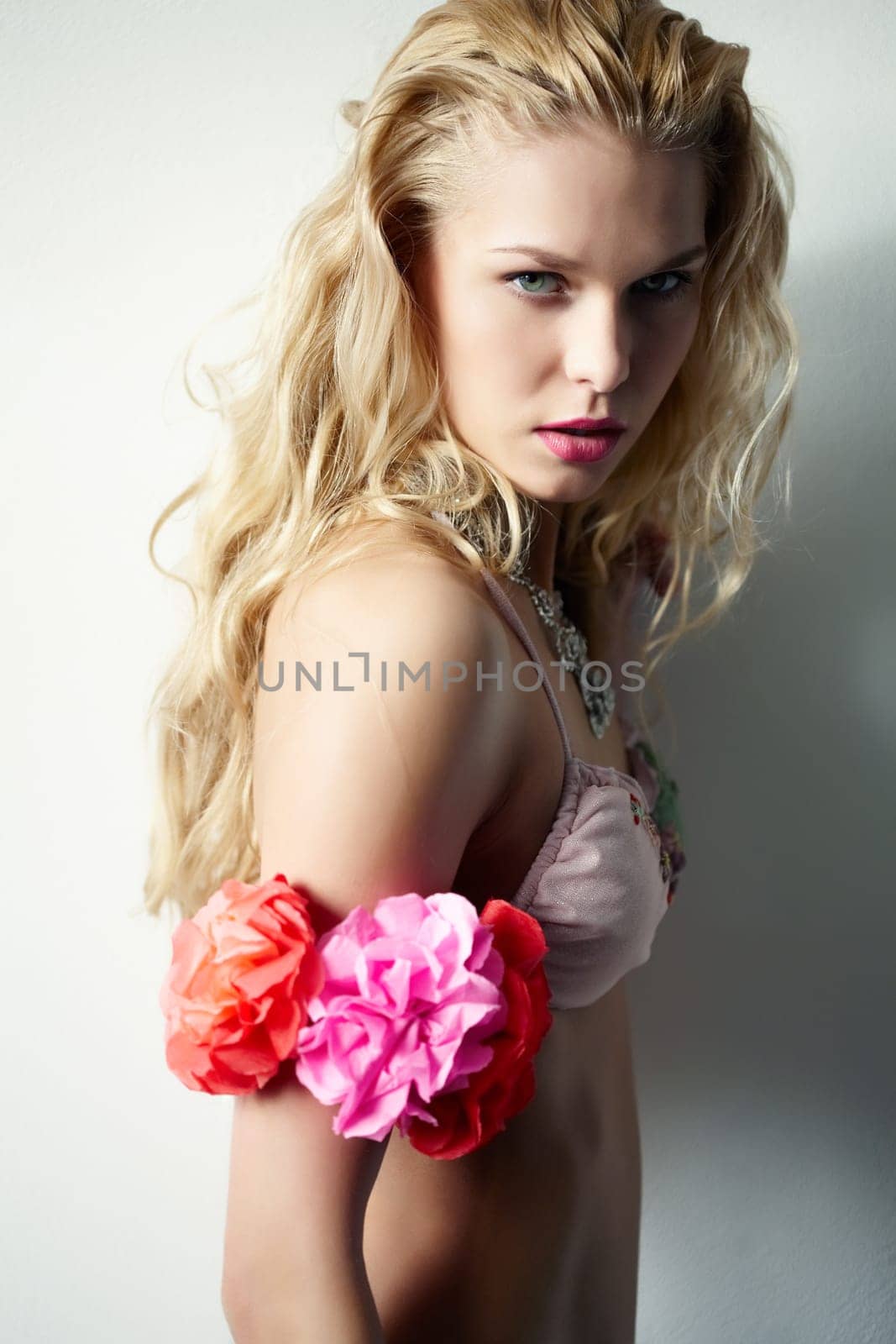 Image of pretty female in bikini looking at camera