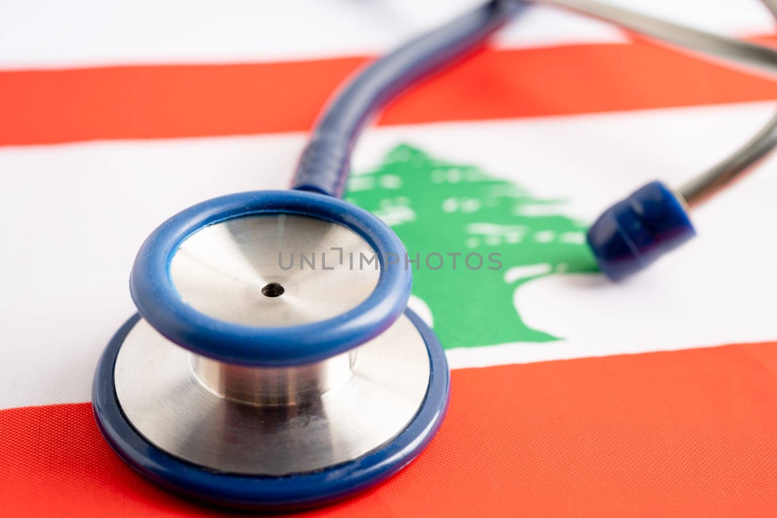 Stethoscope on Lebanon flag background, Business and finance concept. by pamai