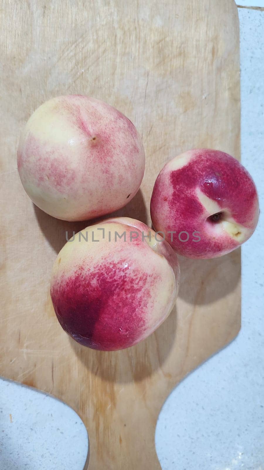fresh peaches fruit food on kitchen board, dessert. High quality photo