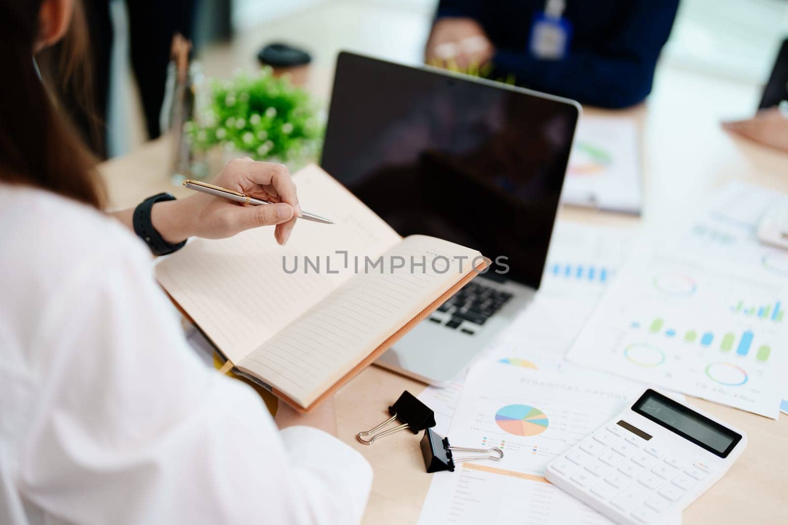 startup business, business advisor strategy for planning finance investment teamwork paperwork audit and discussing marketing, profit, budget of company in meeting room, stock market chart concepts