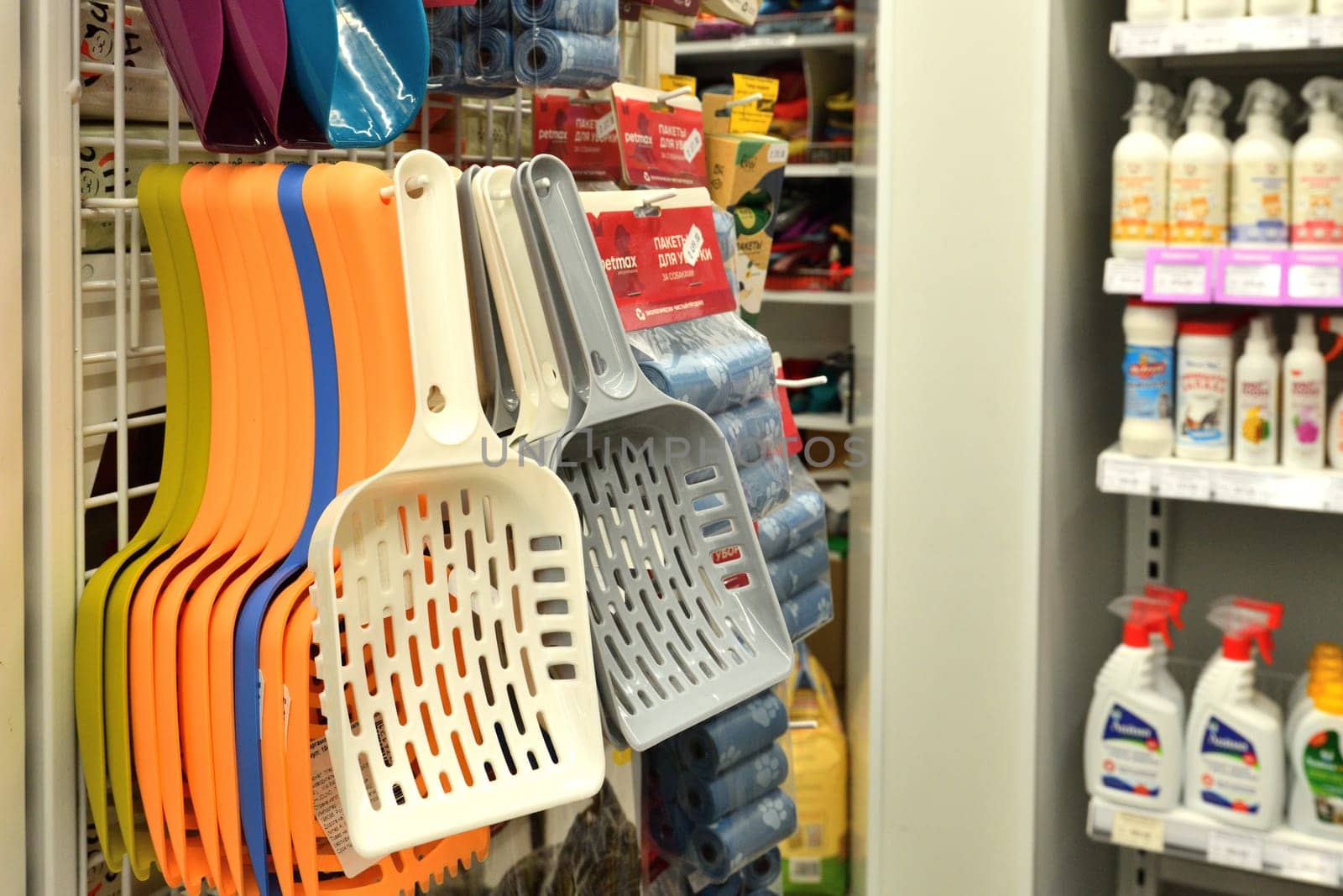 Moscow, Russia - Oct 18. 2023. Dustpan and bags for cleaning up after pets in Four paws pet store at Zelenograd by olgavolodina