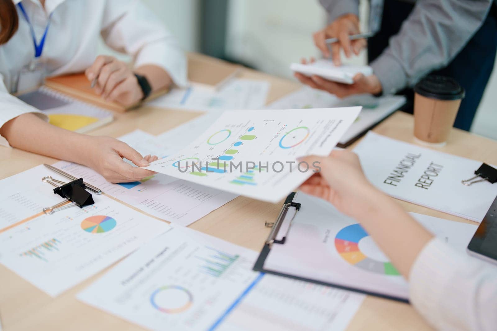 startup business, business advisor strategy for planning finance investment teamwork paperwork audit and discussing marketing, profit, budget of company in meeting room, stock market chart concepts. by Manastrong