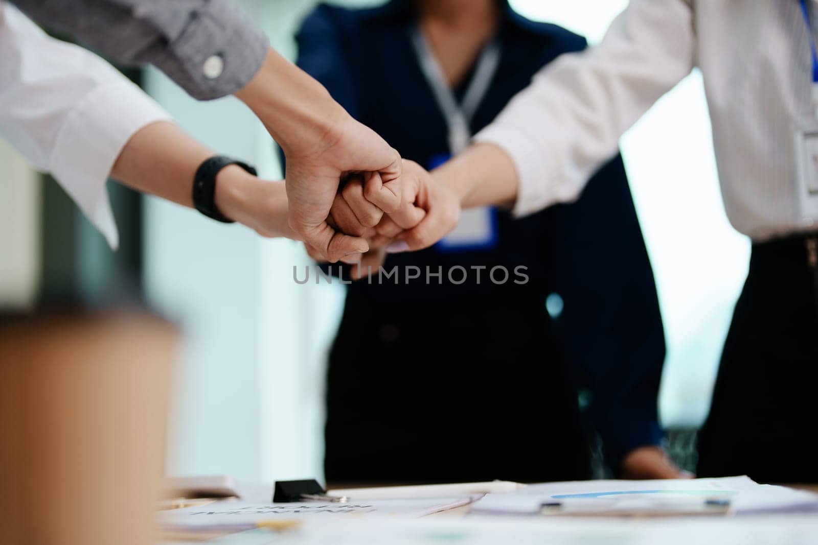 business group people showing unity with their hands together.