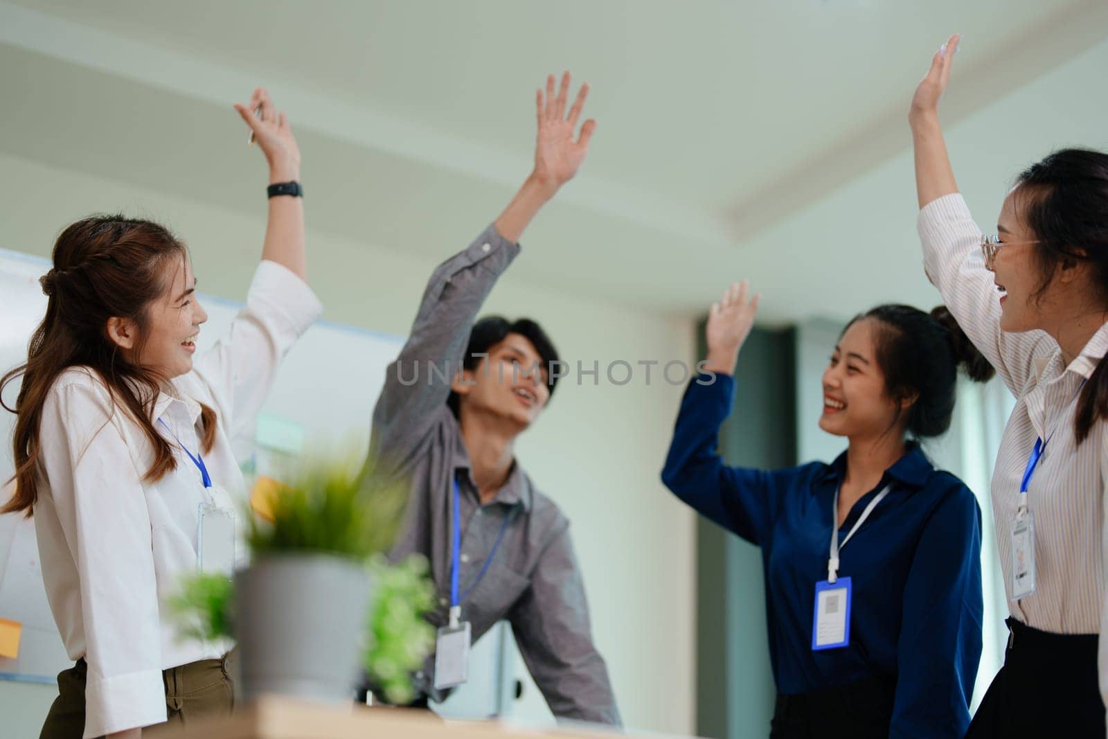 business group people showing unity with their hands together.