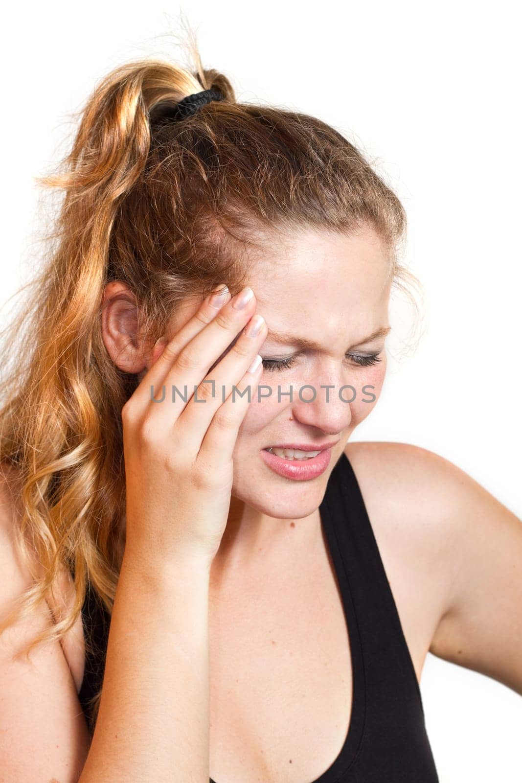 portrait of a caucasian woman with headache