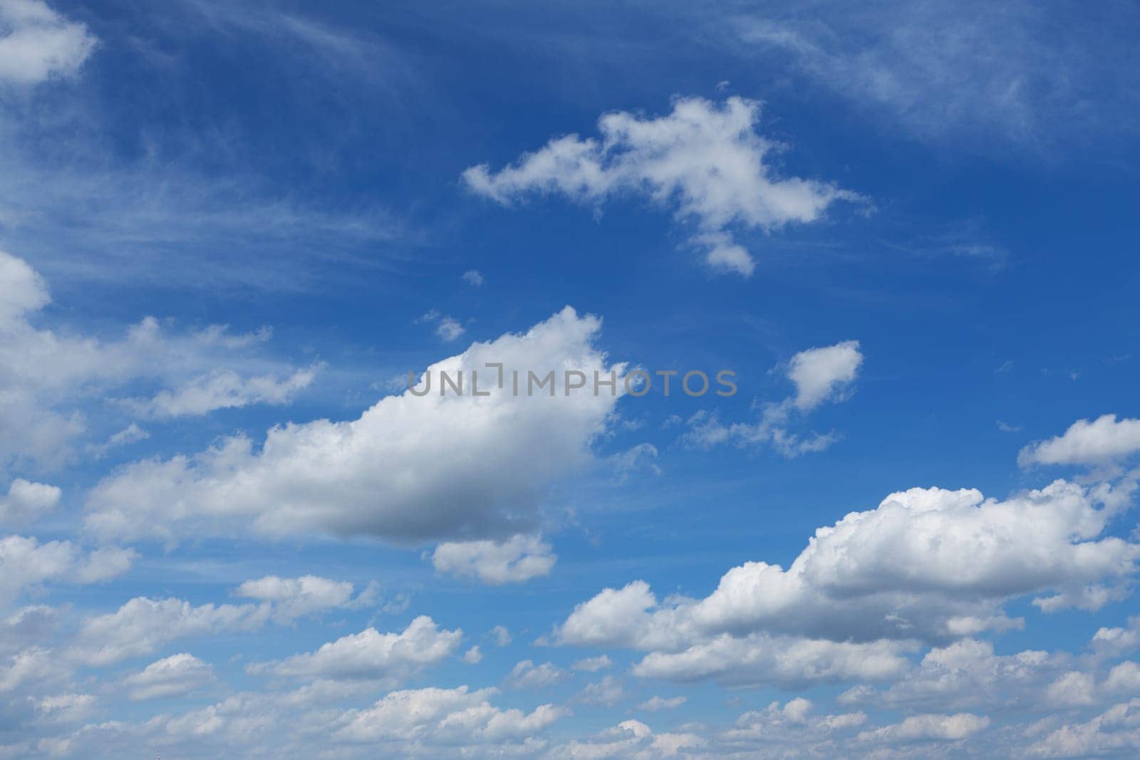 blue sky with cumulus clouds,also suitable as a background