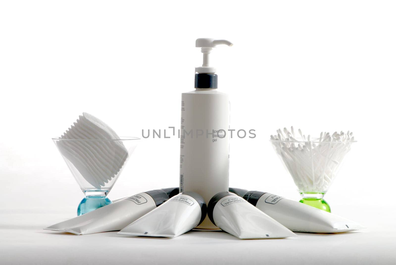 Various professional spa products arranged on a white background