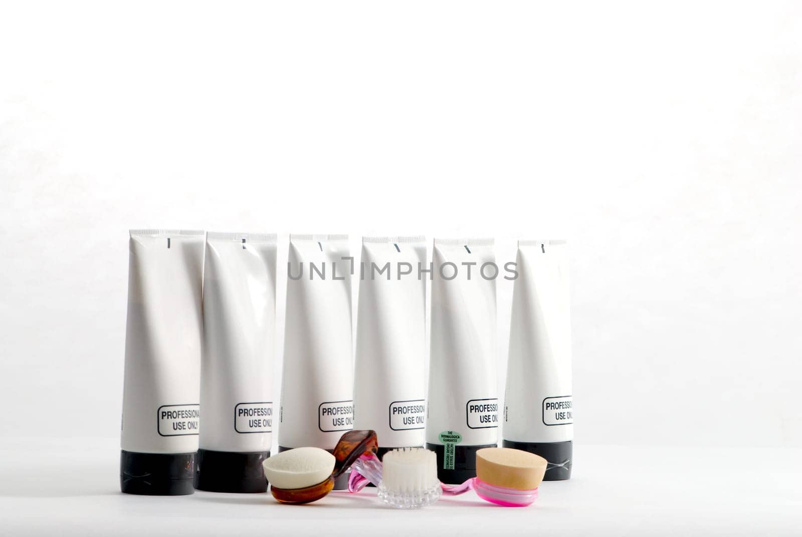 Various professional spa products arranged on a white background