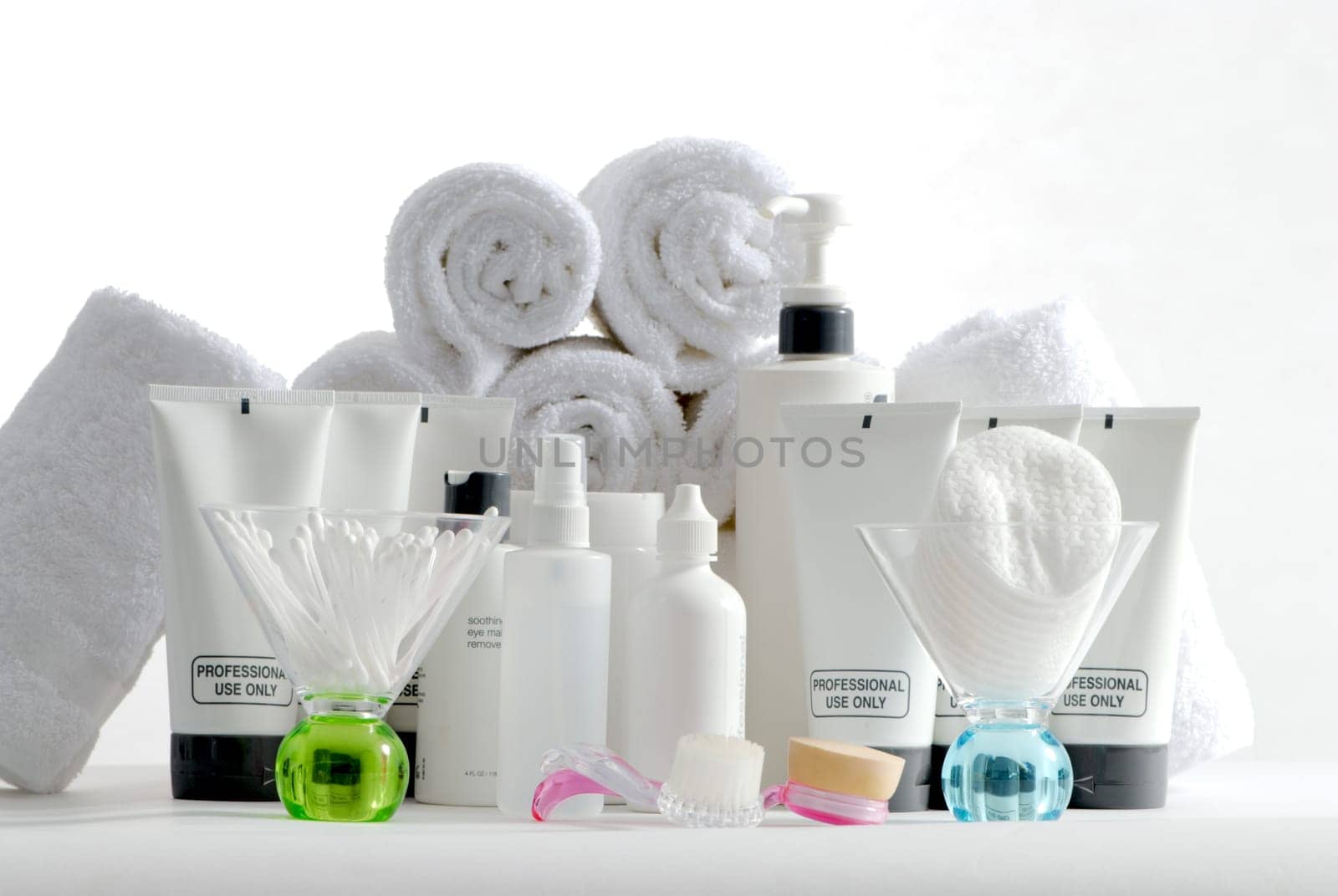 Various professional spa products arranged on a white background