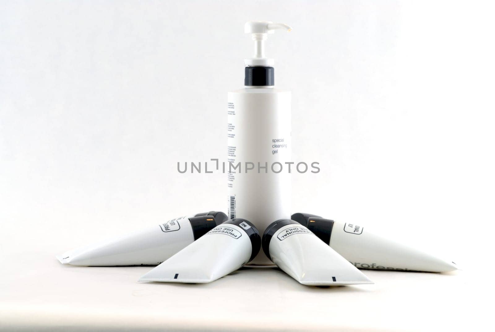 Various professional spa products arranged on a white background