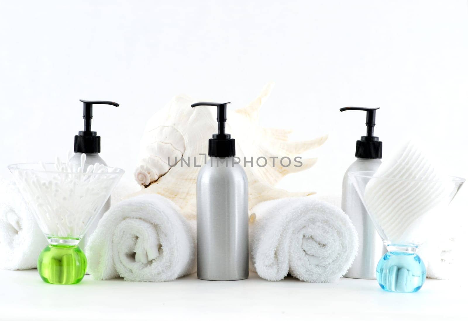 Various professional spa products arranged on a white background
