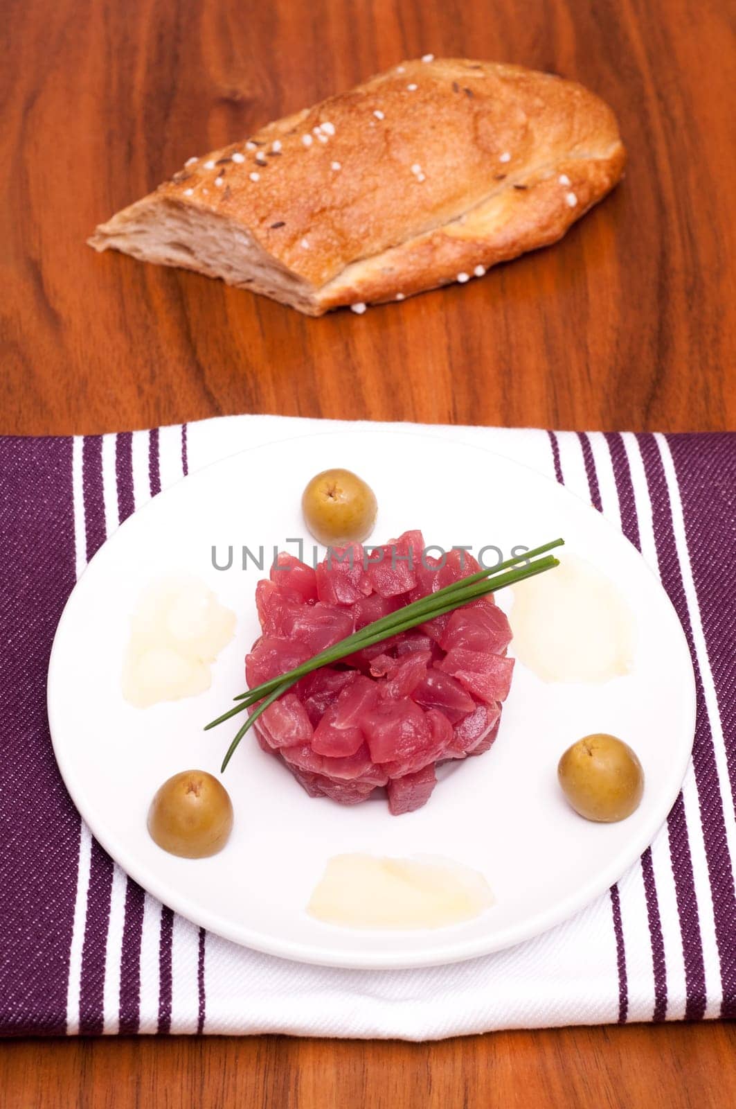 Tuna tartare with chives,ginger and bread