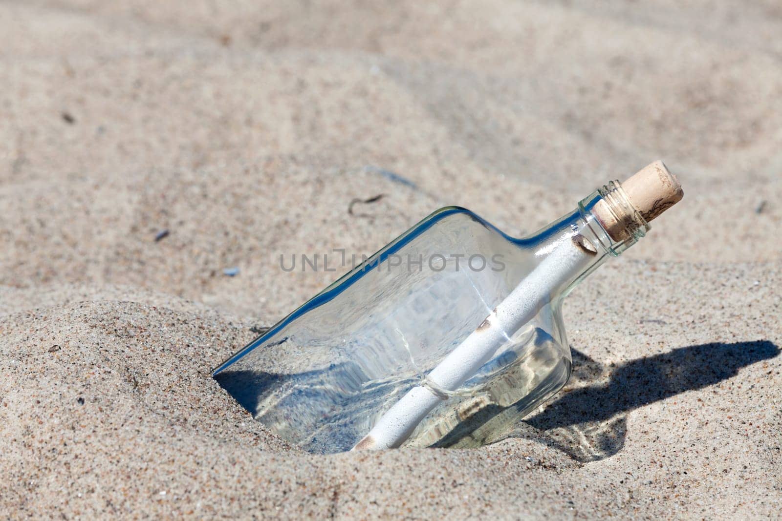 Message in a bottle on the beach