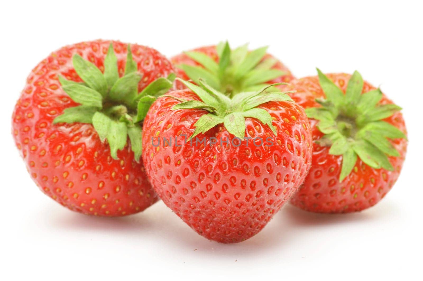 Fresh strawberries isolated on white