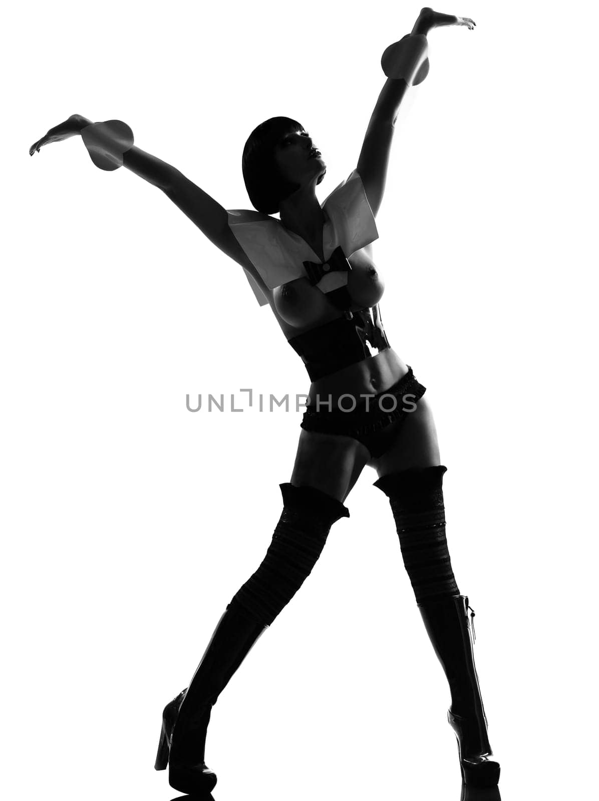 one sexy caucasian sexy woman dress as a maid or soldier silhouette in studio isolated on white background