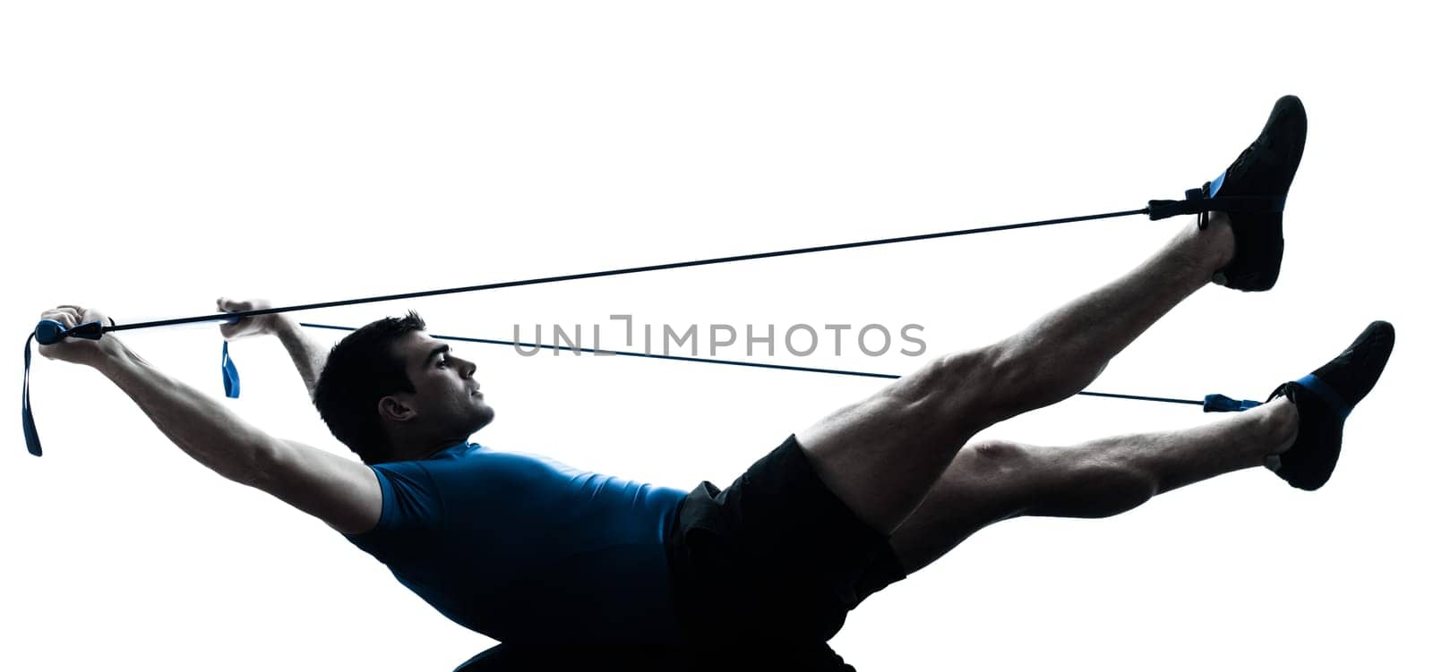 one caucasian man exercising workout fitness in silhouette studio  isolated on white background