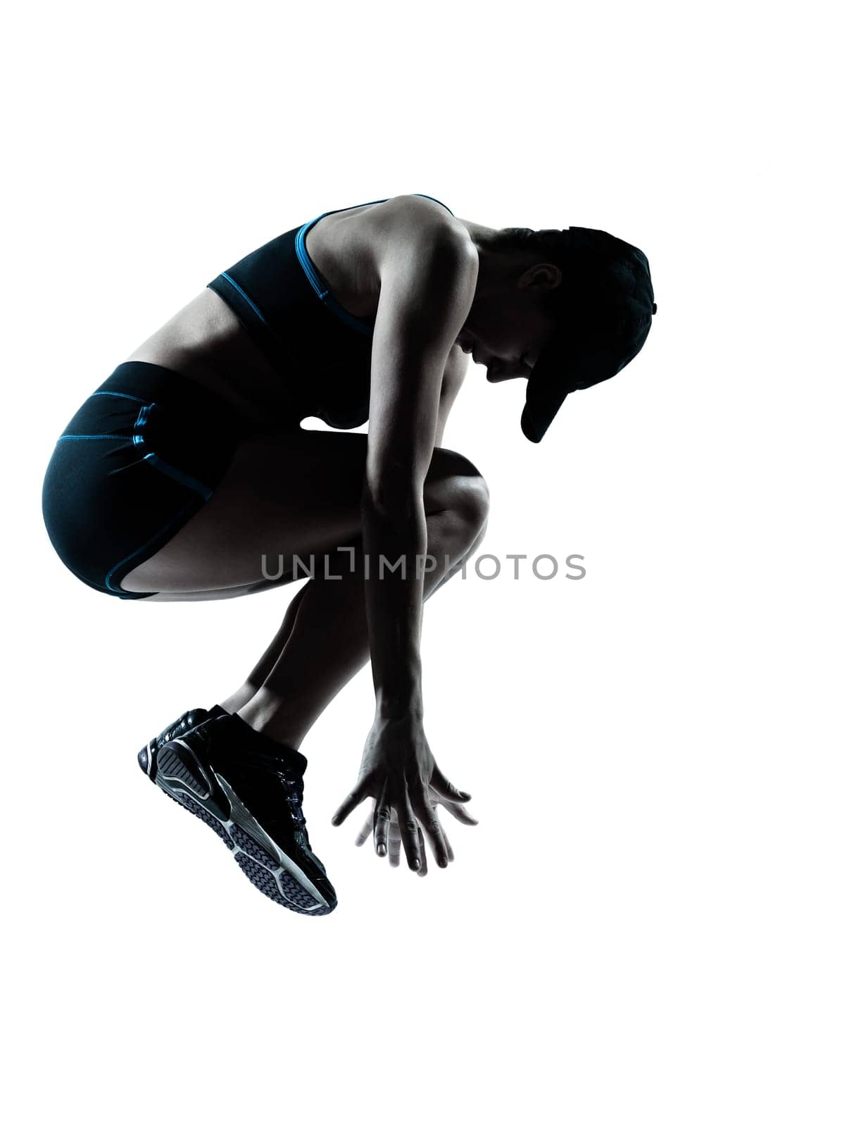 one caucasian woman runner jogger jumping in silhouette studio isolated on white background