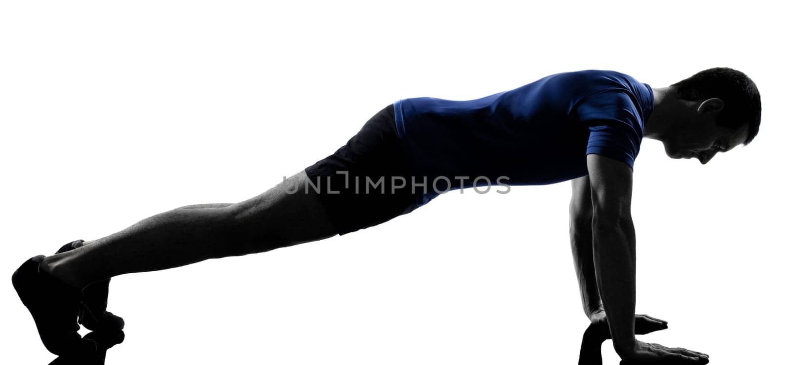 man exercising workout fitness aerobics posture in silhouette studio isolated on white background