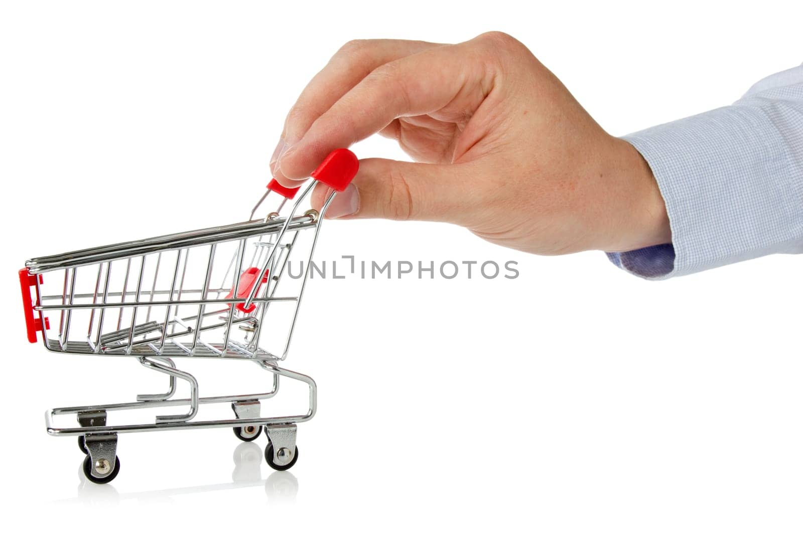 hand with shopping cart over a white background
