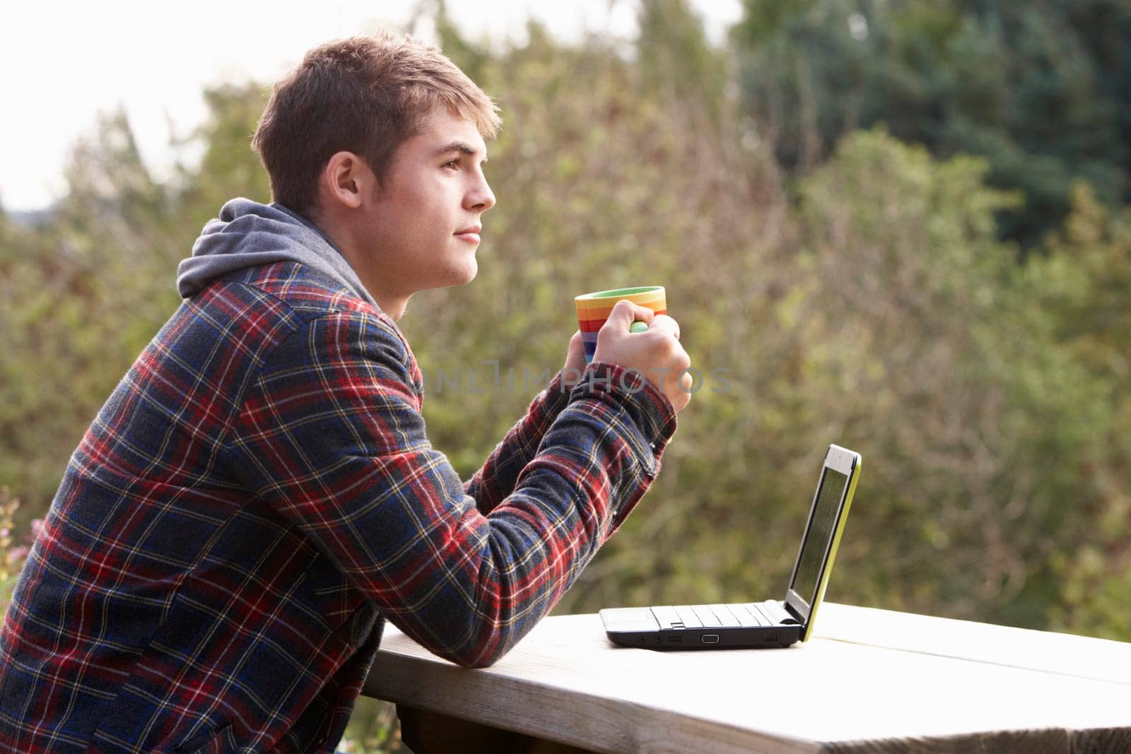 Young man with laptop computer