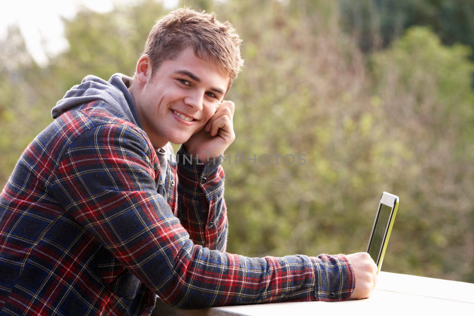 Young man with laptop computer