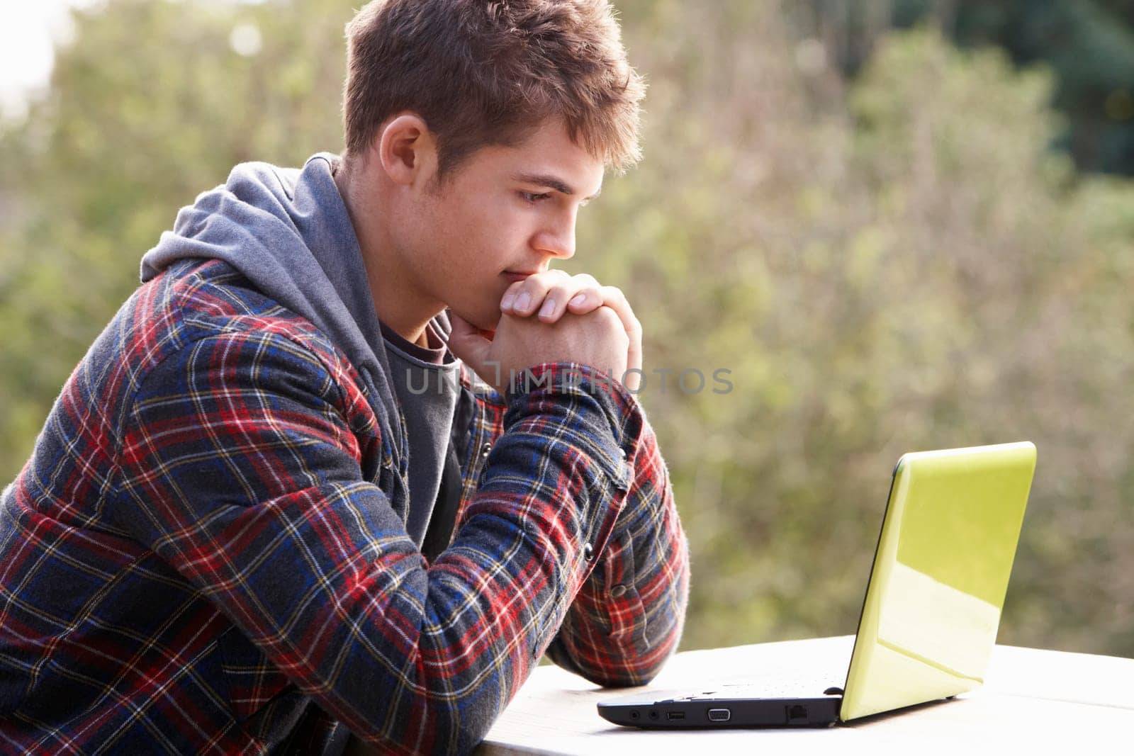 Young man with laptop computer