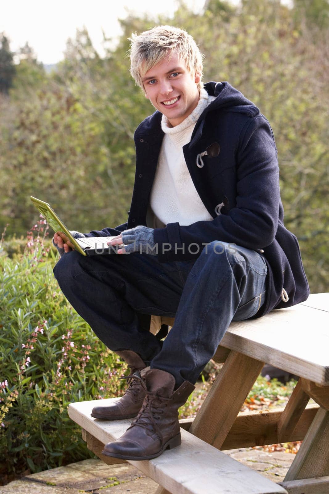 Young man with laptop computer