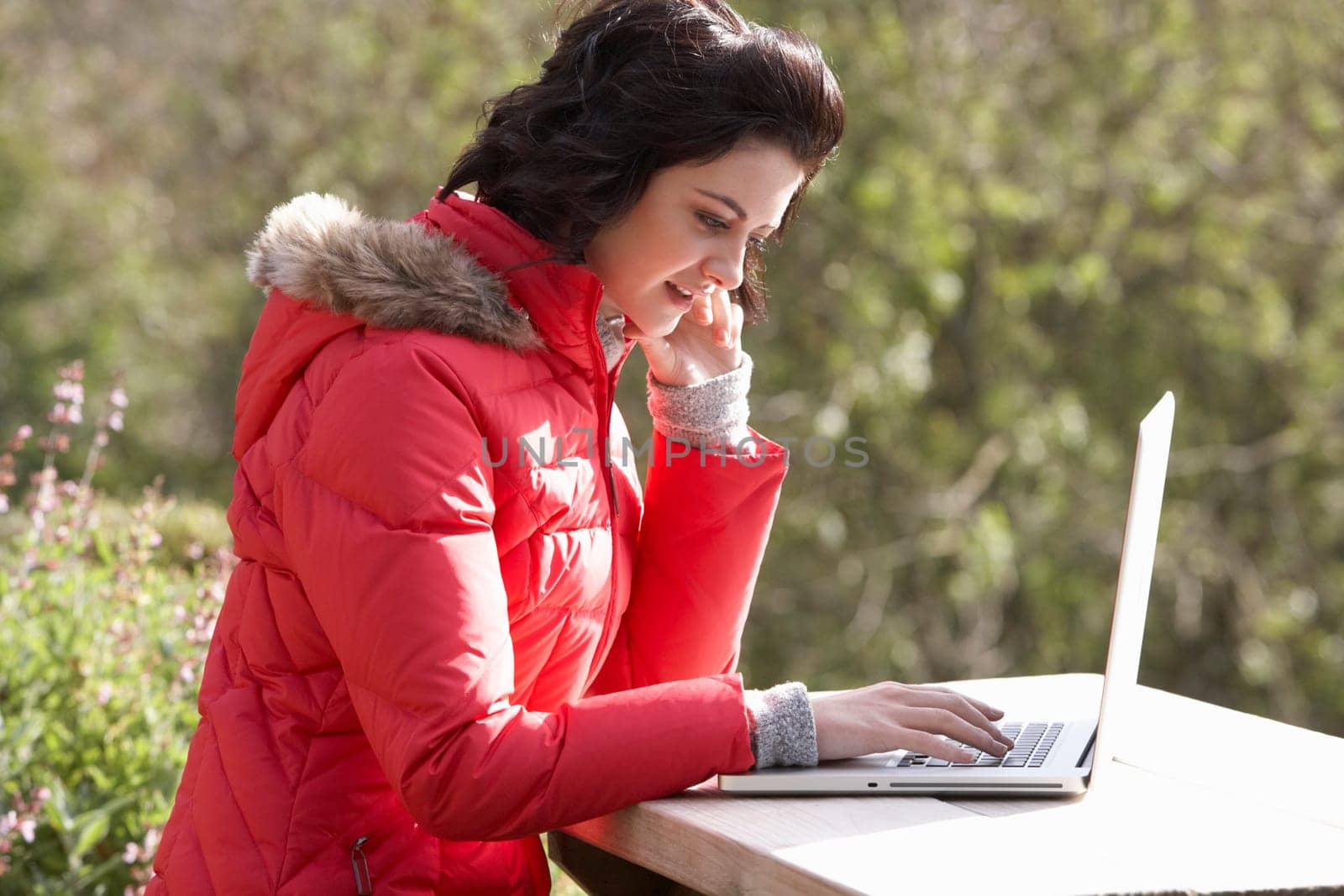 Young woman with laptop computer
