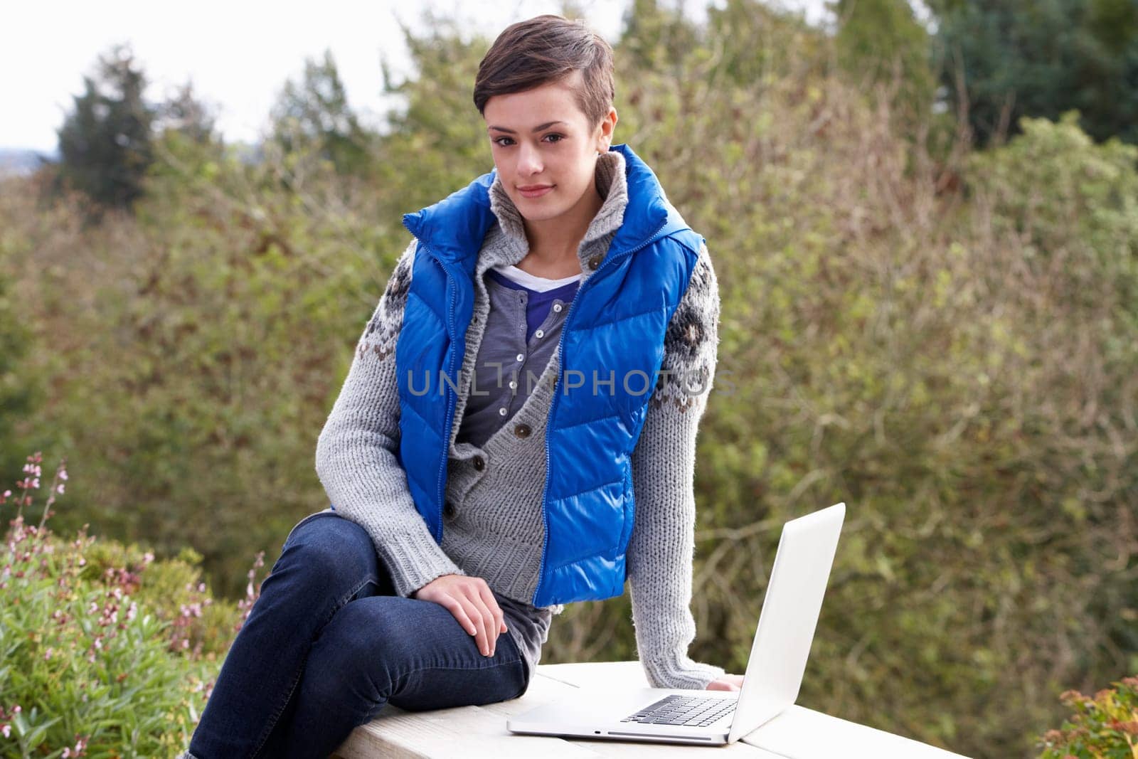 Young woman with laptop computer