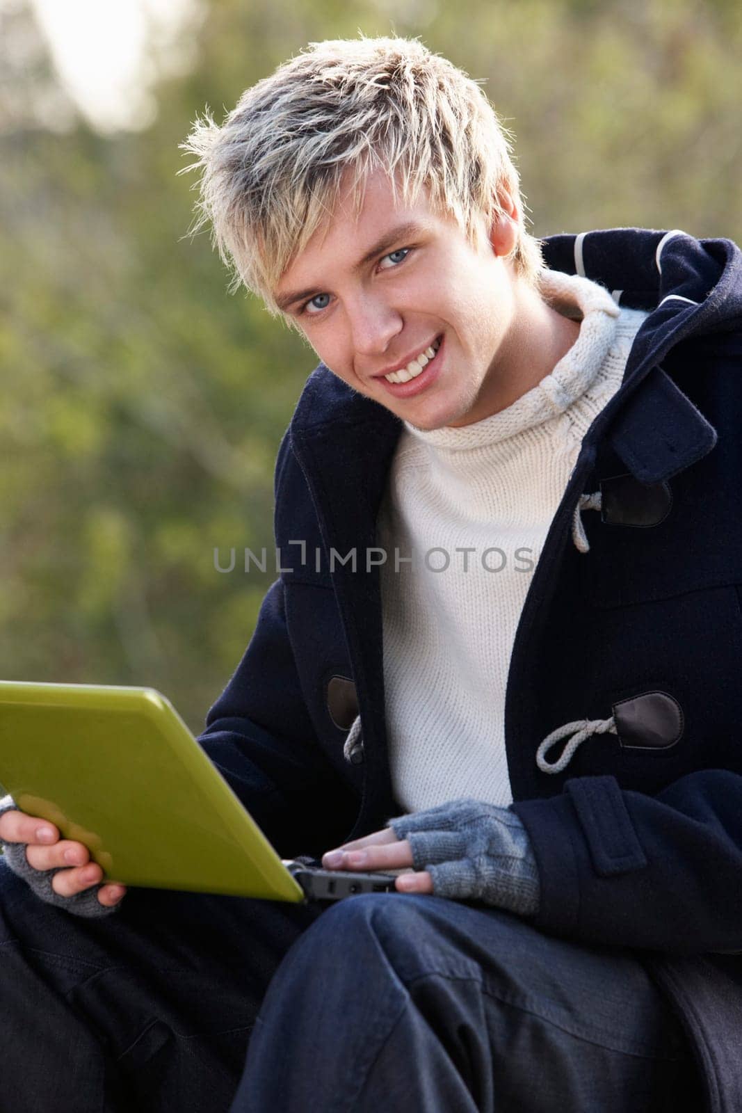 Young man with laptop computer