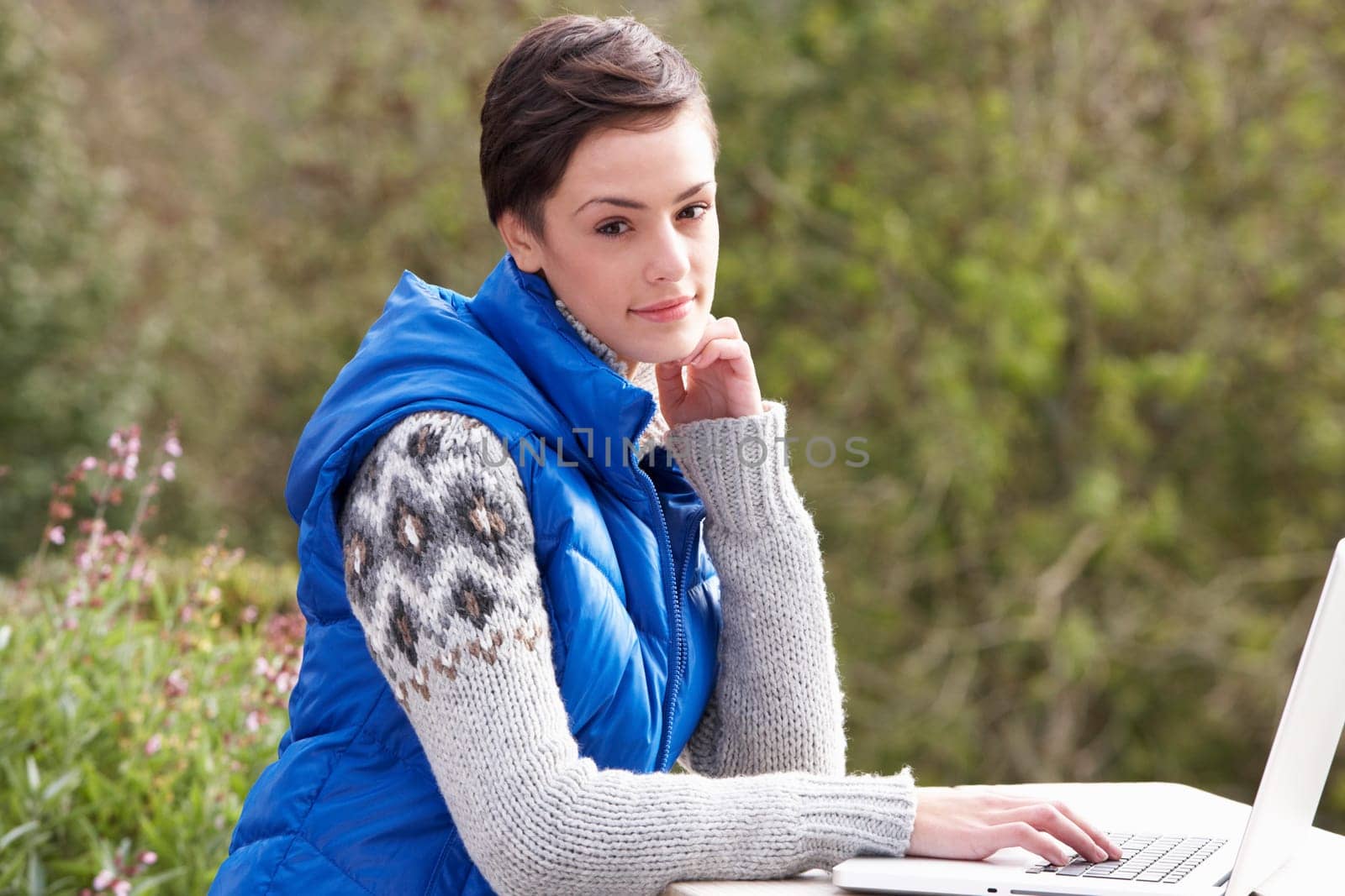 Young woman with laptop computer