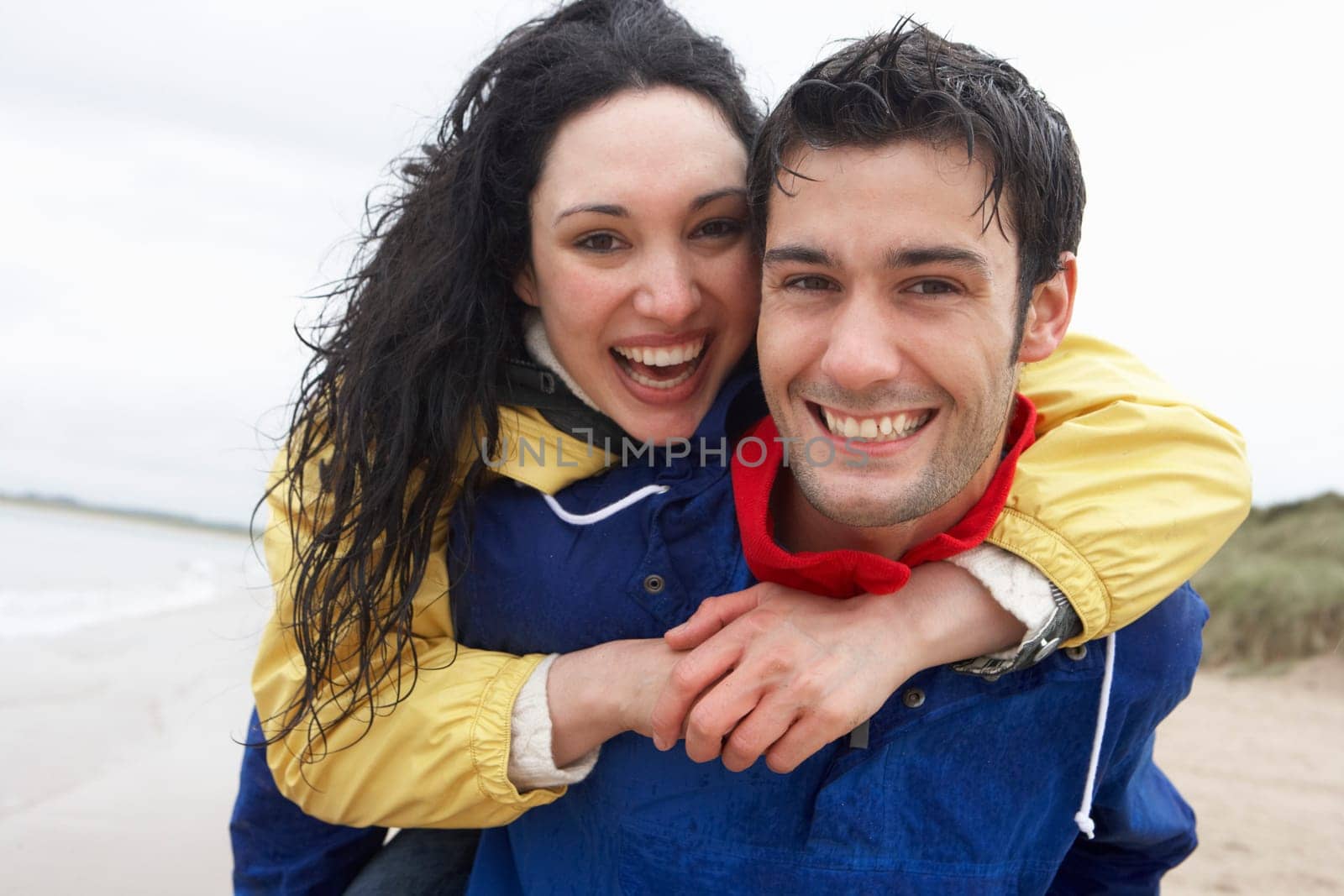 Happy couple on beach in love