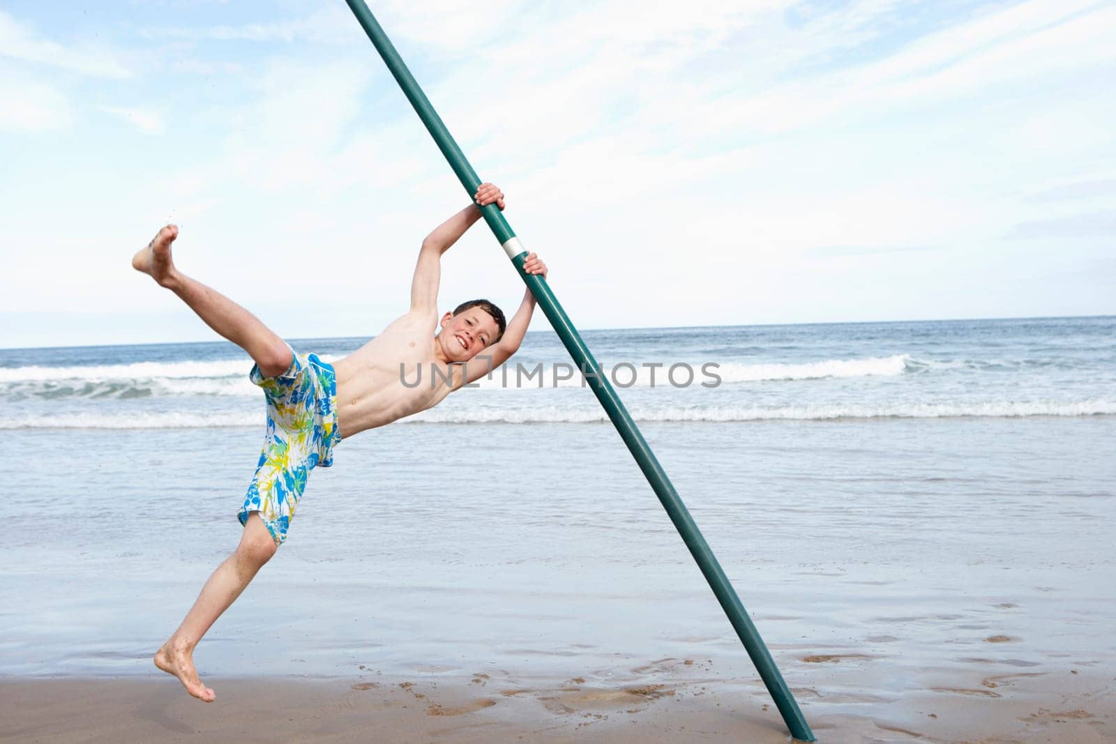 Teenagers playing on beach