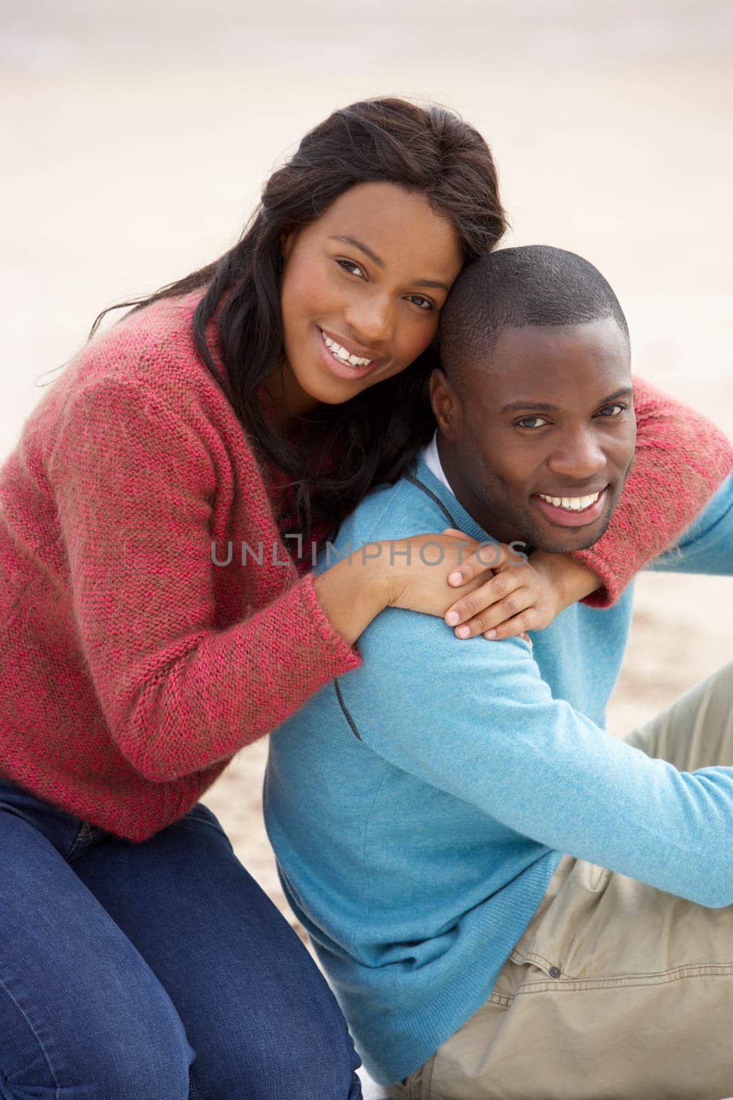 Young couple Embracing on beach