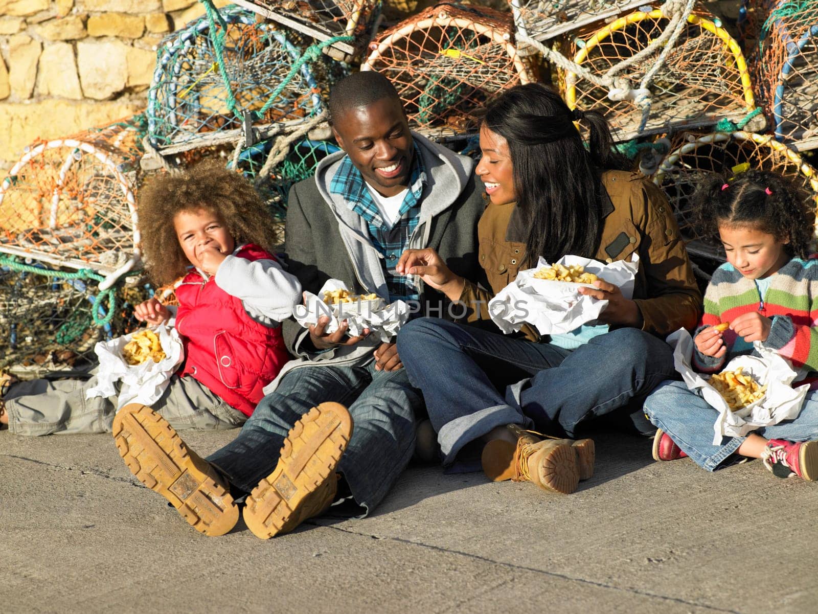 Happy family having picnic