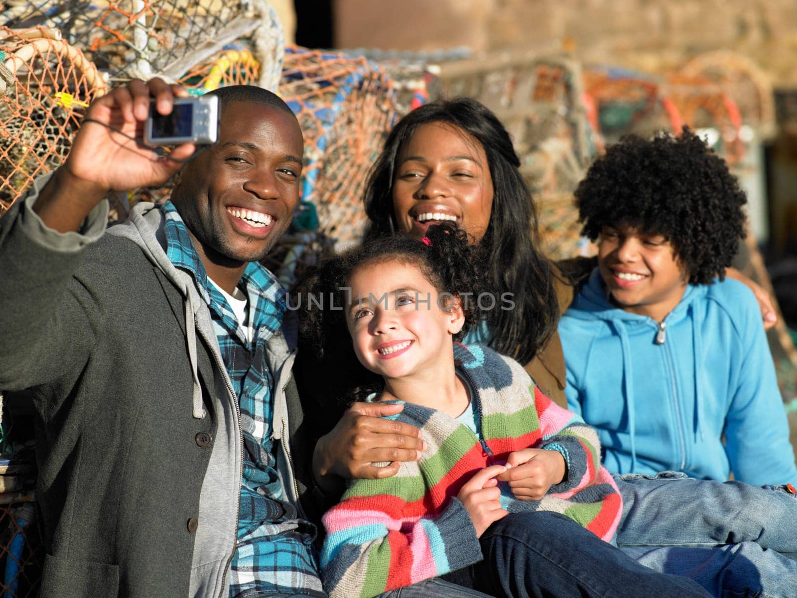Happy family taking photo
