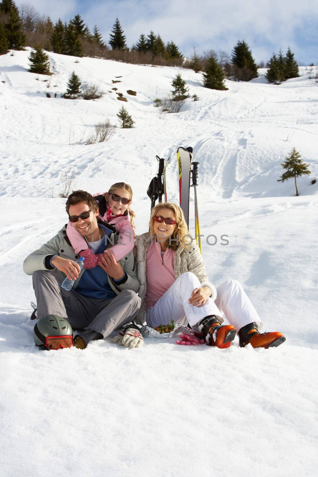 Young Family On Ski Vacation