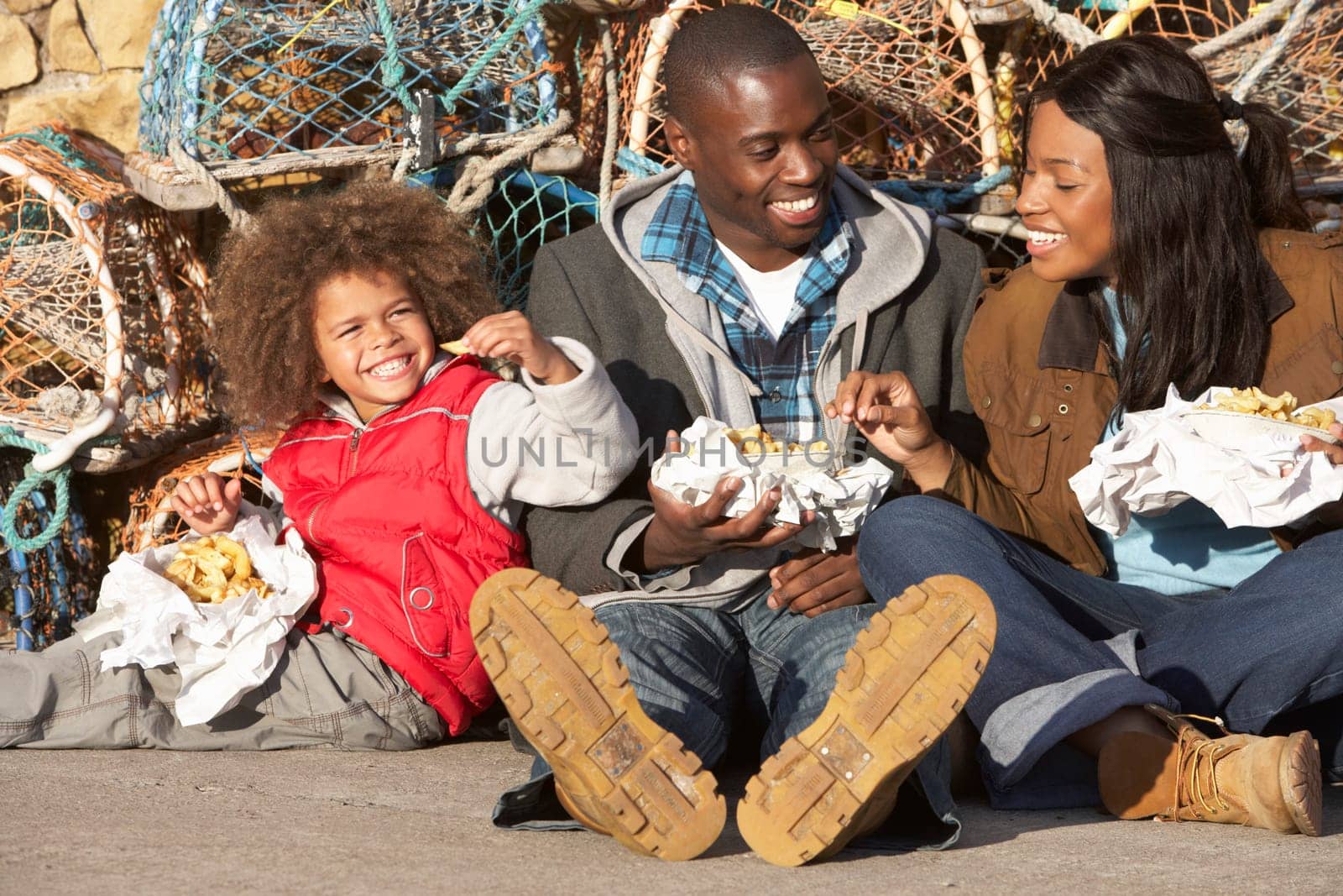 Happy family having picnic