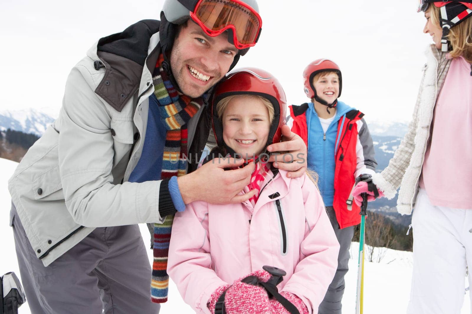 Young Family On Ski Vacation