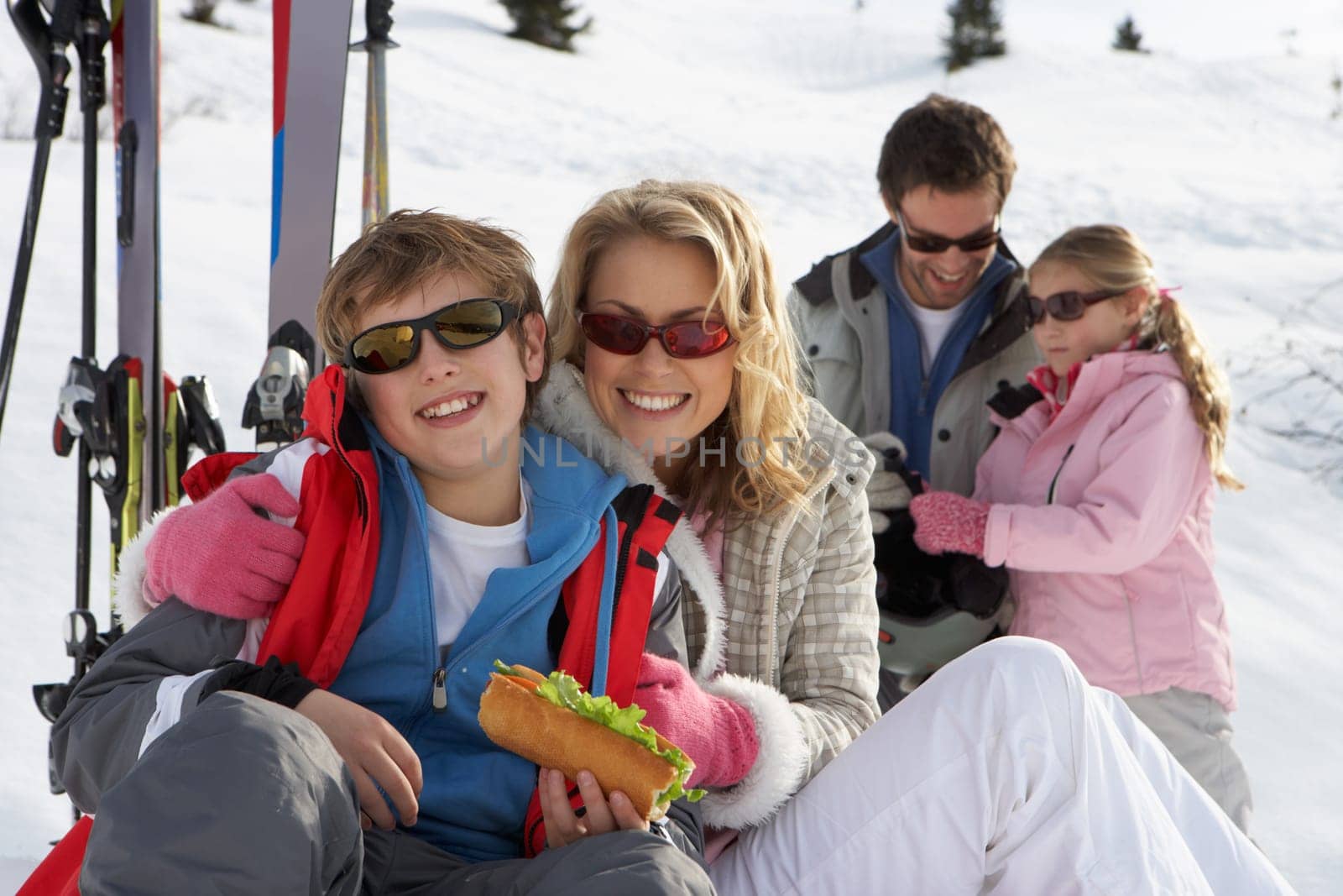 Young Family On Ski Vacation