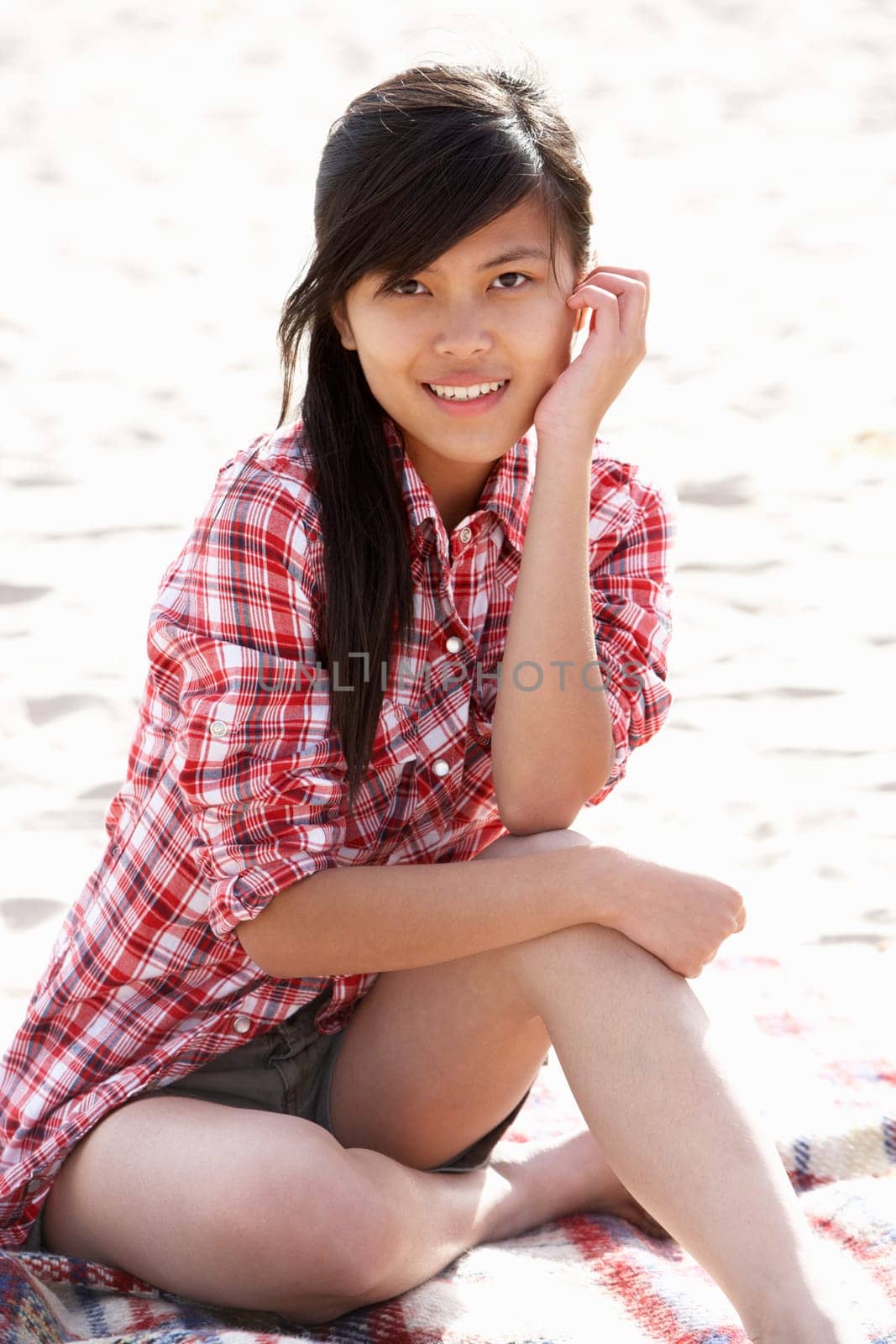 Portrait teenage girl on beach