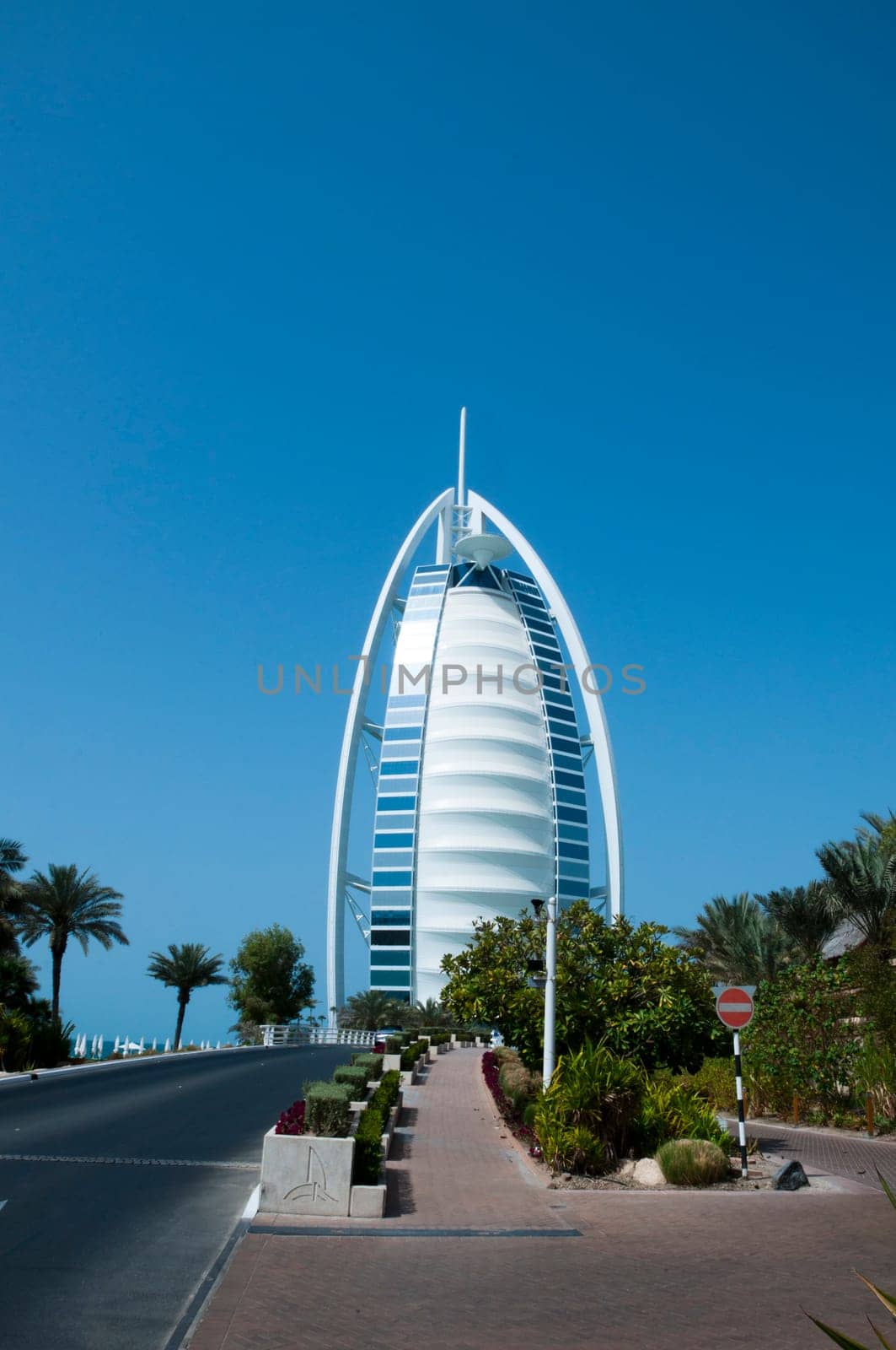 DUBAI - FEB 22 2012 : Burj Al Arab - at 321m second tallest hotel in the world, luxury hotel stands on artificial island, Feb 22, 2012 at Jumeirah beach, Dubai, United Arab Emirates